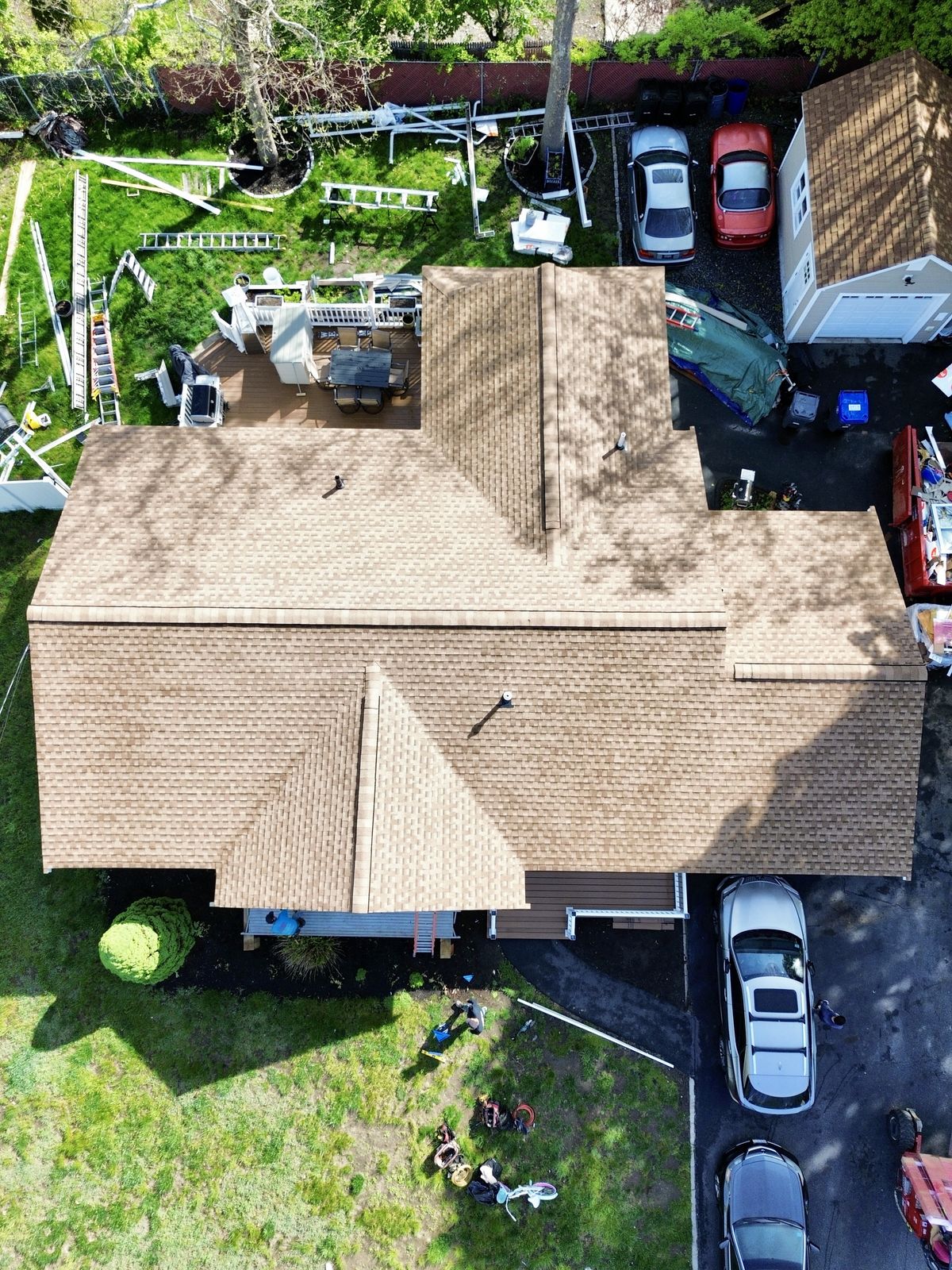 Finished architectural shingle roof, aerial top-down view